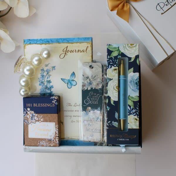 Faith-inspired gift box with floral journal, scripture pen, '101 Blessings for a Precious Friend' card set, pearl hair clip, Christian bookmarks, and Petit Pressie packaging